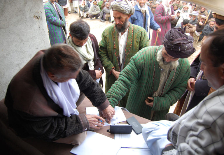 East West News Service - 2 - Illiterate Workers Are Identified By Their Fingerprints