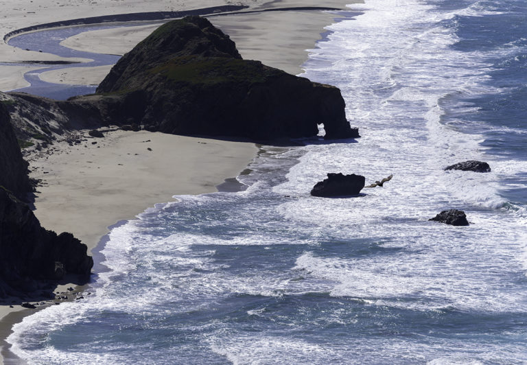 Sea arch and open beach, Big Sur