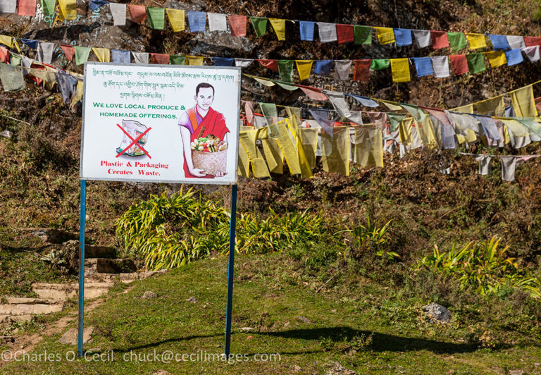 Bumthang, Bhutan. Environmental Sign, Discouraging Plastic Waste, Encouraging Locally-grown Food. By Entrance to Kurje Lhakhang Temple.