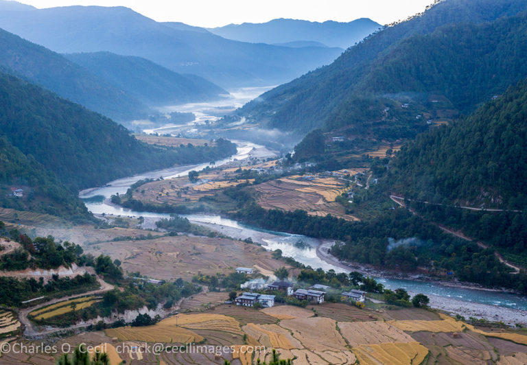 Punakha, Bhutan. Morning Mist in the Mo River Valley.