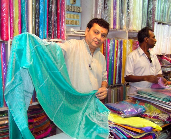 Mumbai silk salesman displays high quality yet reasonably priced silk, Silk in Mumbai India 