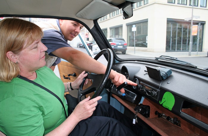 Writer Susan McKee in a Trabant