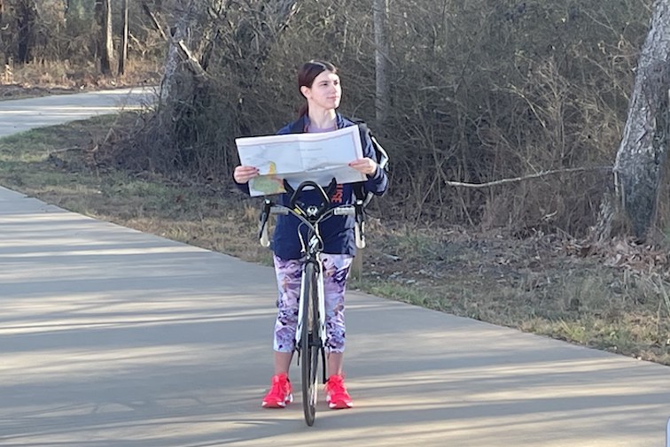 Young girl on bicycle on Big Creek Greenway in Alpharetta, GA. 