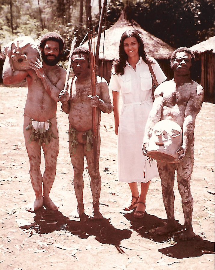 Single Woiman with New Guinea Mud Men