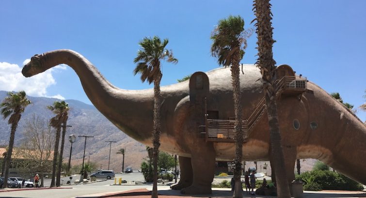 The waitress chased Pee-wee Herman around Dinny the Dinosaur at the Cabazon Dinosaurs roadside attraction in the 1985 Pee-wee’s Big Adventure. copy The waitress chased Pee-wee Herman around Dinny the Dinosaur at the Cabazon Dinosaurs roadside attraction in the 1985 Pee-wee's Big Adventure.