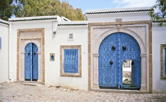 Tunisia, Sidi Bou Said. Doors to Courtyard.