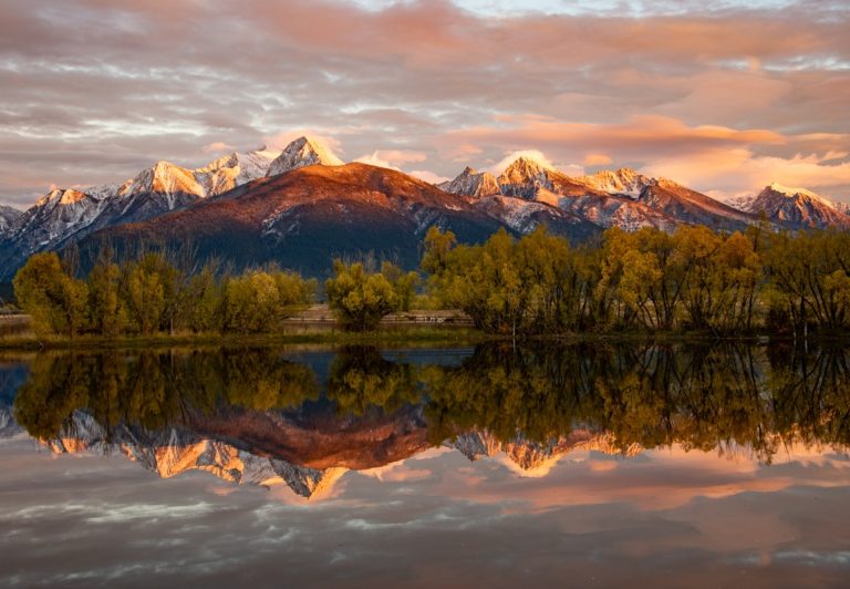The Mission Mountains, part of the Flathead Indian Reservation, are spectacular with the last light of the day bathing them in rich colors.
