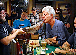 Anthony Bourdain kisses the cod at Christian's Pub in St. John's Newfoundland