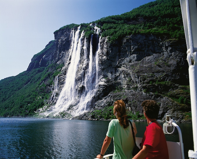 Seven Sisters waterfall seen from a boat in Geirangerfjord.