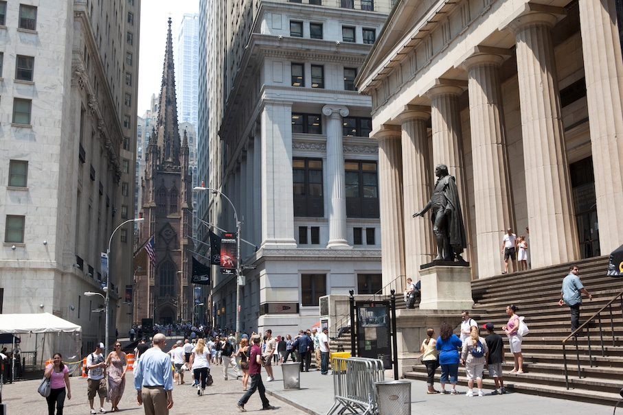 Federal Hall and Trinity Church are located in the financial district of Lower Manhattan. - International America