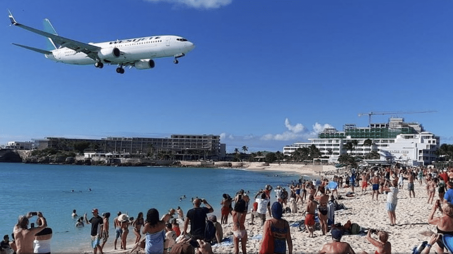 Plane spotters at Maho-Sunset Beach on St. Maarten