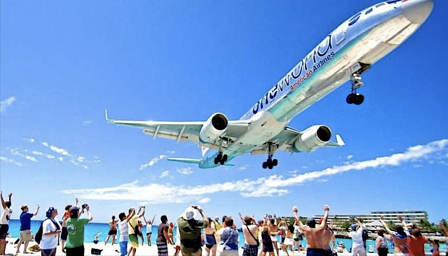 Plane spotters watch landing at Princess Juliana Airport on the island of St. Maarten