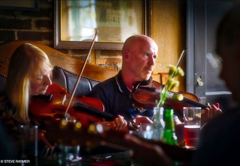Man-and-Woman-Playing-Stringed-Instruments