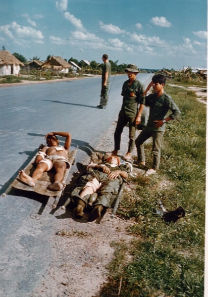 waiting for medevac on Highway 13 in Saigon Vietnam