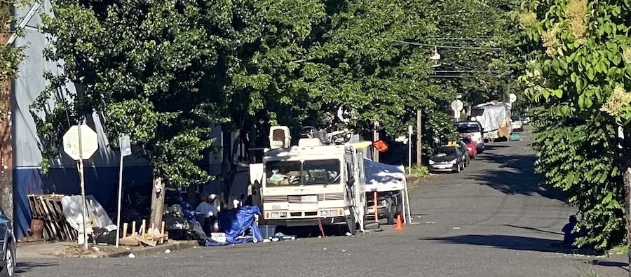 Campers and tents on residential street