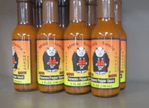 Bottles of Monk Sauce