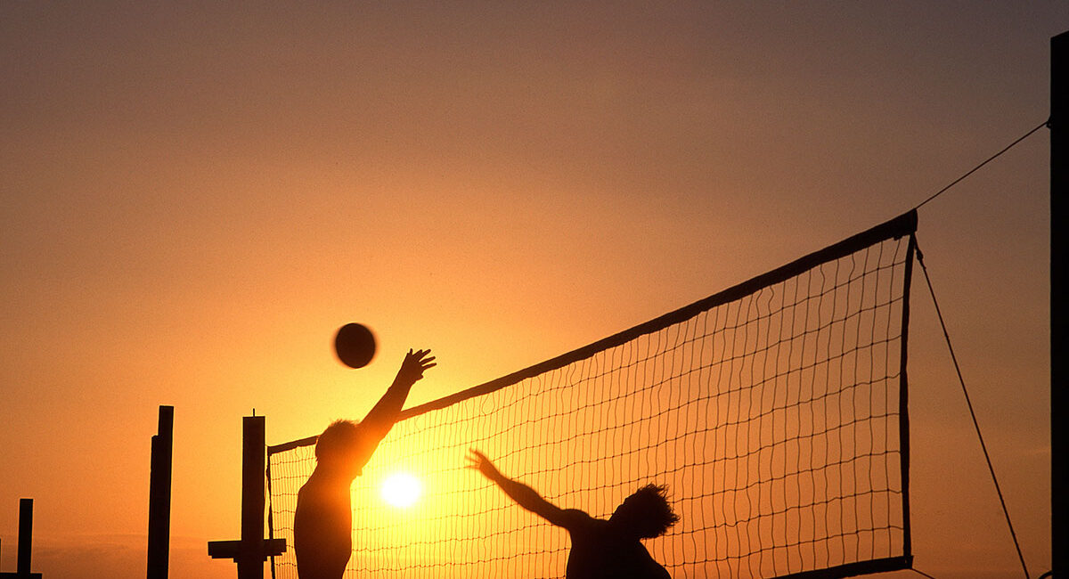 beach-volleyball-players-at-sunset beach volleyball players at sunset