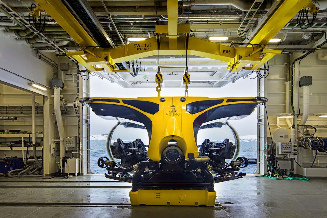 Enormous hoists can rapidly offload the two submarines stored in the cavernous hangar on Viking's expedition ships like the Octantis and Polaris.
