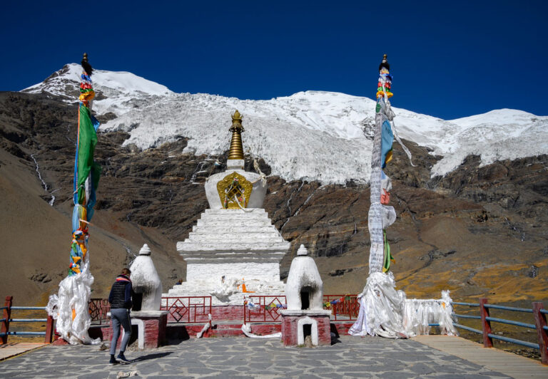 The Karola Glacier, one of Tibet's three major continental glaciers, is easily seen from the Friendship Highway. The pullout to view the glacier makes for a very scenic pit stop, especially with the stupa and prayer flags framing the glacier from the viewing stand.
