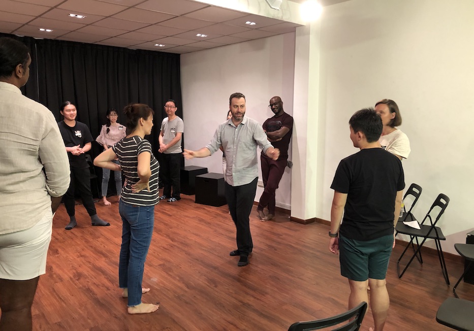 Improv Ambassador Byron Kennerly conducts a workshop in Singapore for people interested in learning about unscripted, impromptu improv comedy. 