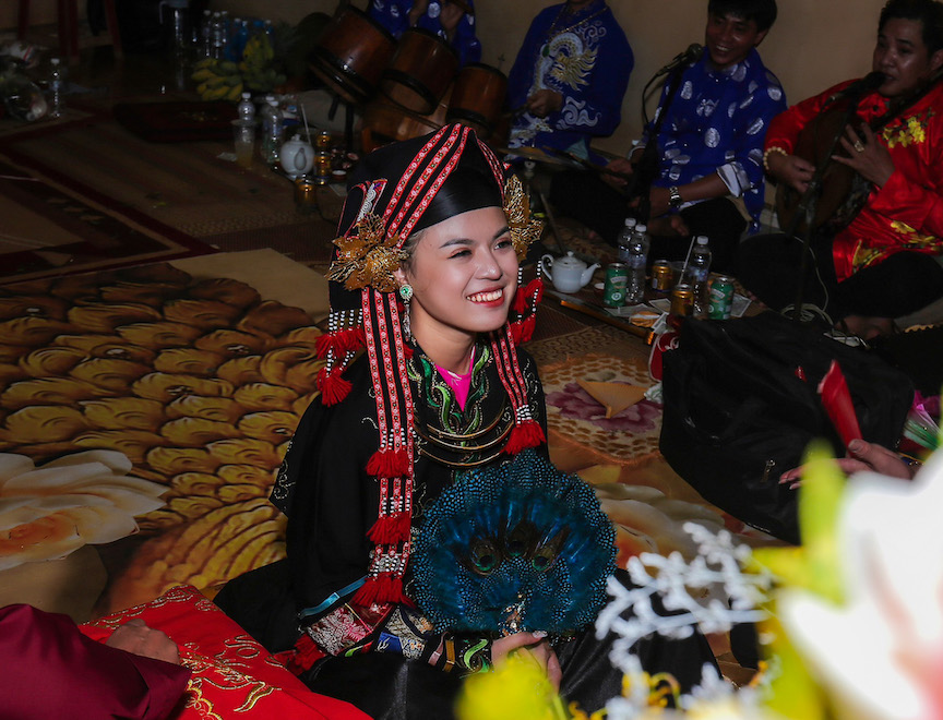 Lam Nhi hopes the Tứ Phủ goddesses, heaven, earth, water and high mountains, will bless her with happiness.