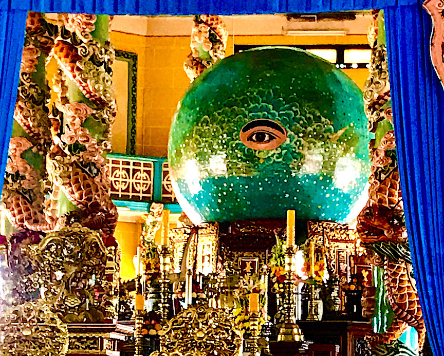 The left eye of Cao Đài (“Highest Power”) maintains a 24-hour vigilance over parishioners at the religion’s Holy See in Tay Ninh, Vietnam.