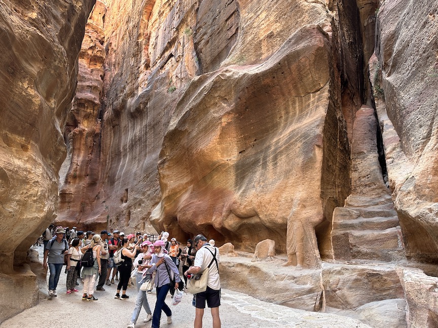 Hundreds of visitors traverse the Sik every day.