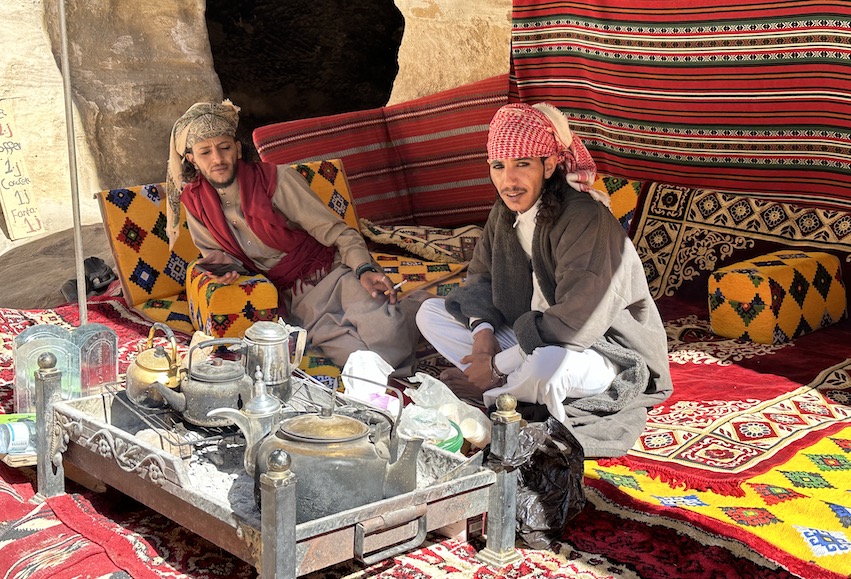 Bedouin men drink tea