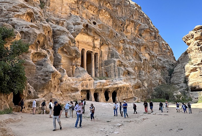 Foreign tourists enter the ancient of Petra through the "back door" of Little Petra.