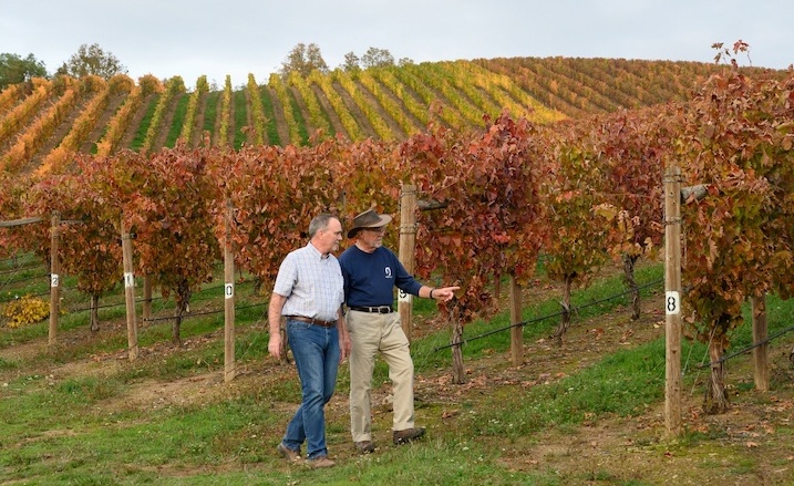 Abacela Winery founder Earl Jones and his son Greg, Abacela's current CEO, inspect their vineyard.