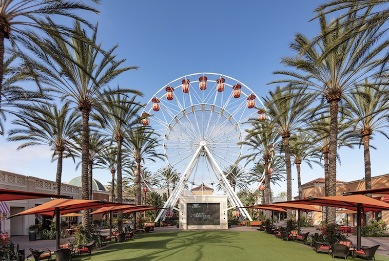 Tired of spending money on luxury products? Then pop outside for a quick ride on the shopping center's Ferris wheel.
