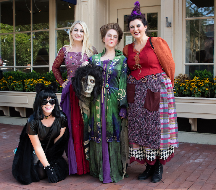 Costumed women pretending to be witches in Salem, Massachusetts.