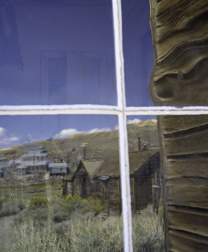 Antique glass windows still reveal sites of Bogie and the Standard Mine that once made a generation of miners prosperous.