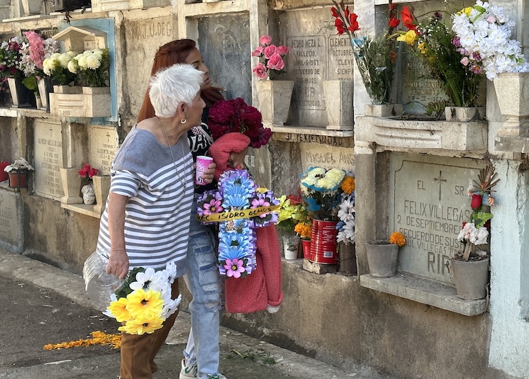 Visitors spending a day with the dead at the Santa Paula cemetery in Guanajuato.