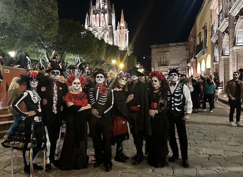 Tourists from Louisiana assemble for a Dia de los Muertos stroll.