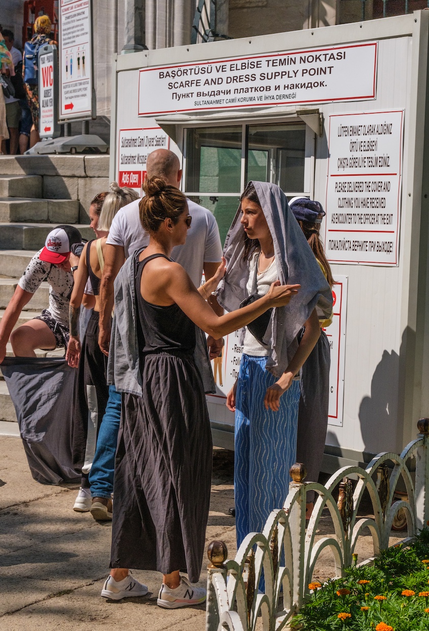 Office Provides Appropriate Dress for Tourists at the Blue Mosque in Istanbul, Turkiye