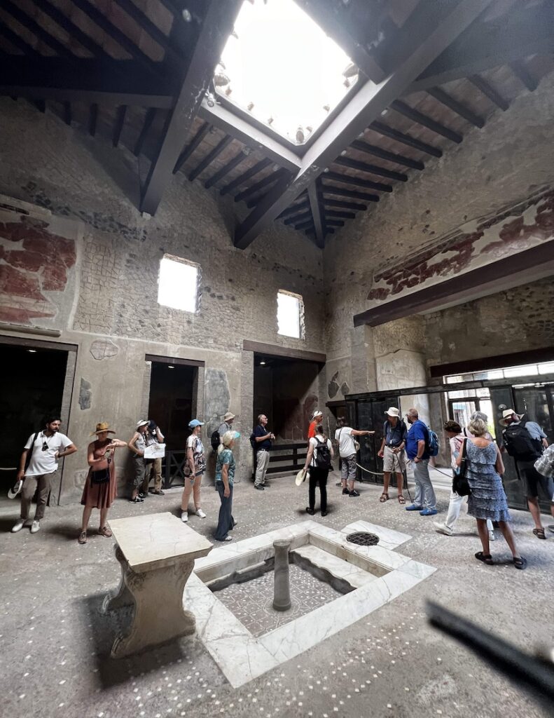 Wealth residents of Herculaneum took advantage of the temperate climate by having openings in their roof that would allow in light and rainwater that would fall into an impluvian that would catch and hold the water.