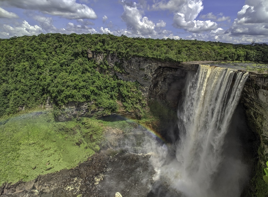 Visitors to Kaieteur Falls usually see a rainbow hovering beside the curtain of water. 