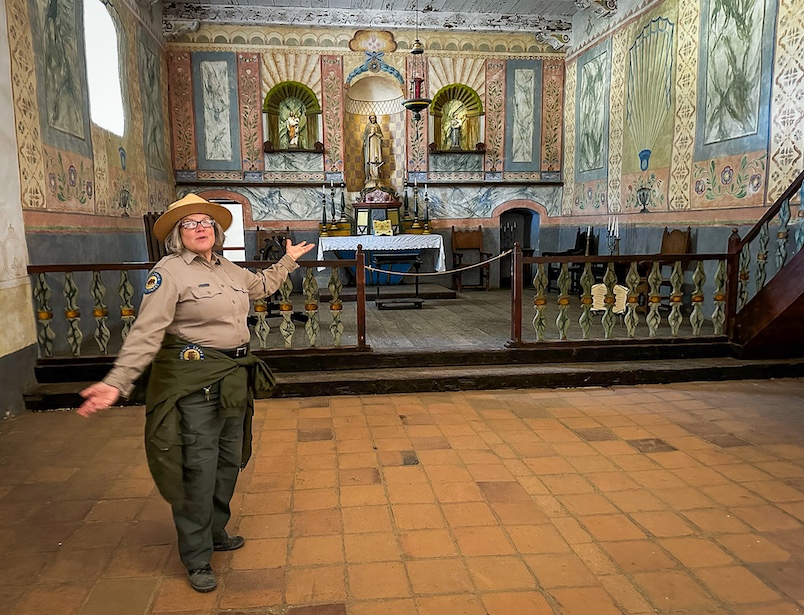 California State Park Ranger Leaah Braitman excorts visitors around Mission of the Immaculate Conception of Holy Mary which was completed in 1787. 