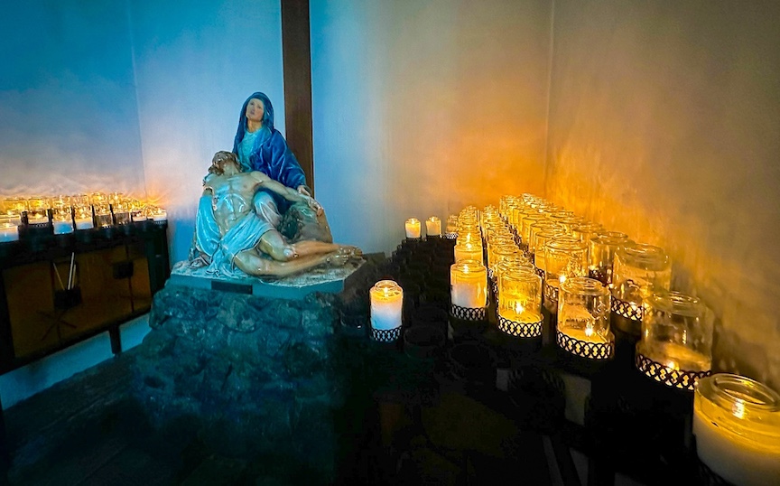 interior of Mission San Luis Obispo showing a statue of La Pieta.