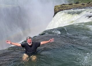 The author at the edge of Victoria Falls