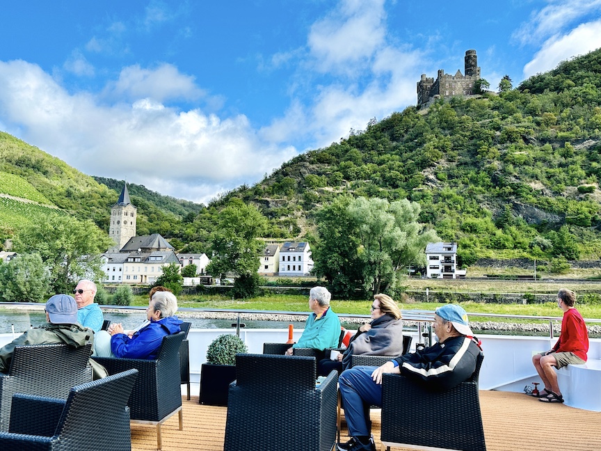 A leisurely Rhine River cruise passes hilltop castles. 