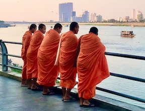 monks at Tonle Sap river monks at Tonle Sap river