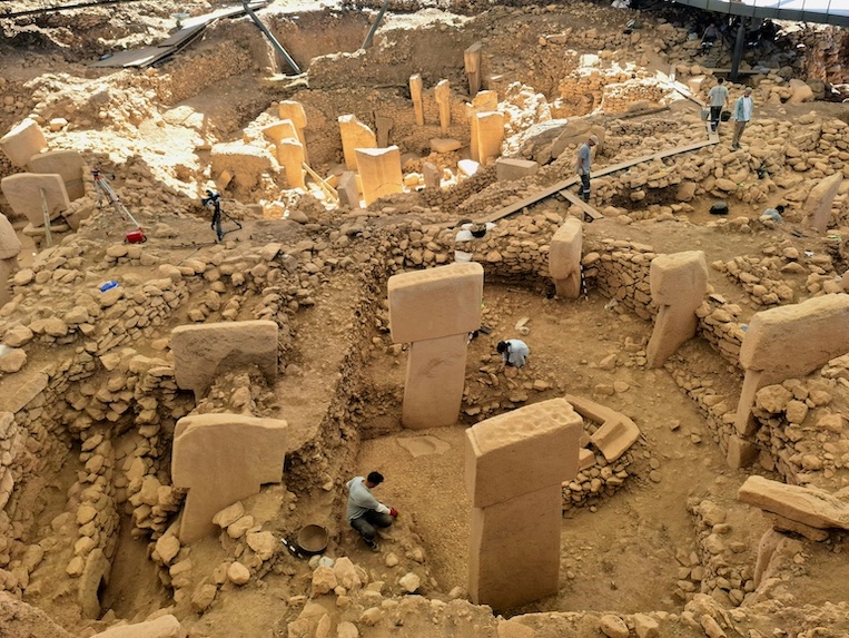 Archaeologists clean Göbekli Tepe's limestone pillars.