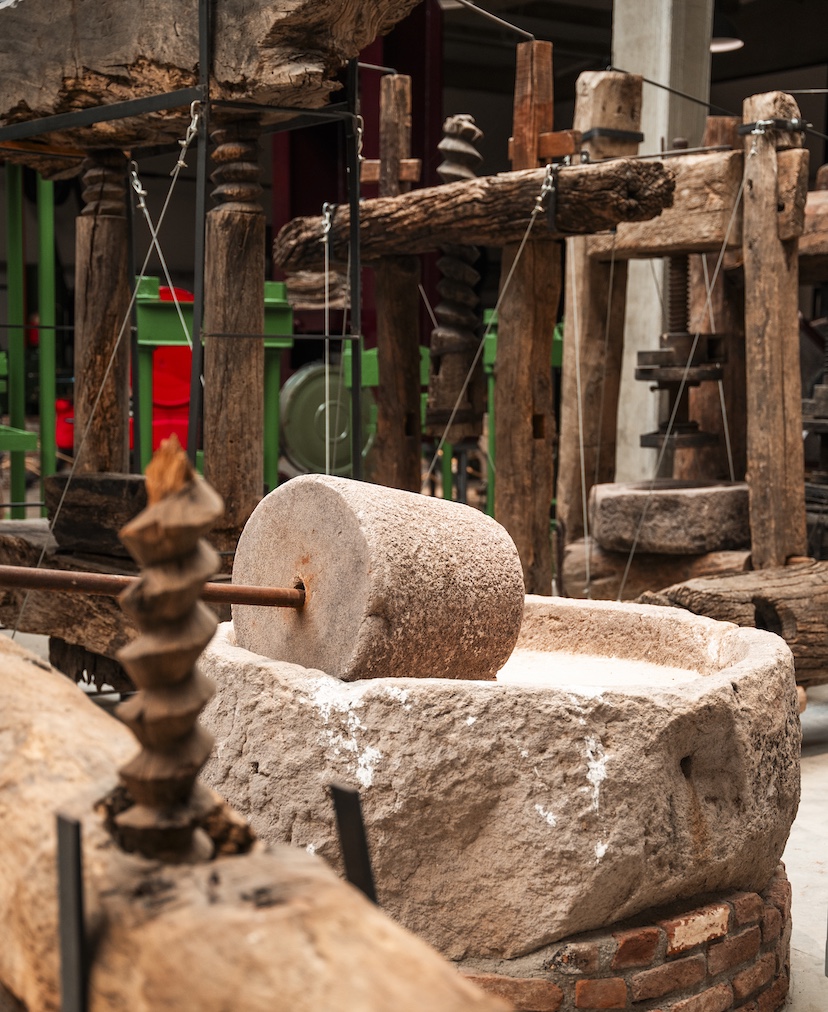 This traditional olive oil press is on display at the Köstem Olive Oil Museum.