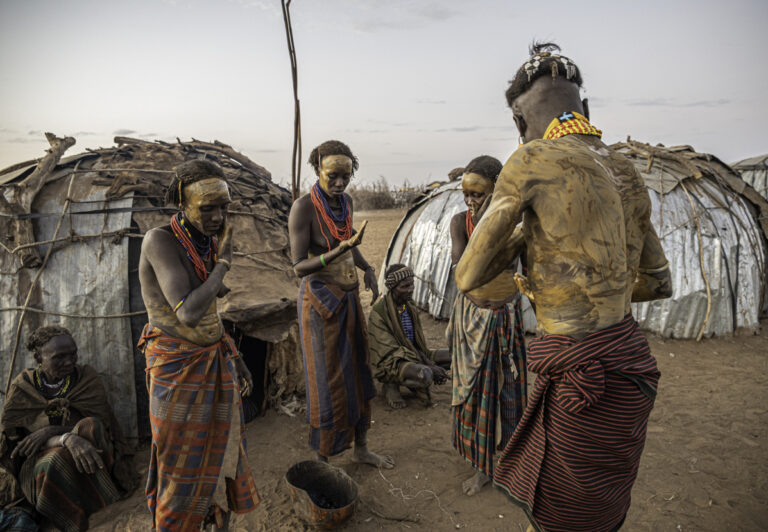 An essential ritual of the Dassanech tribe is Dimmi, a special blessing given to firstborn daughters between the ages of 8 and 10. Temporary huts are built at a special site, where goats and cattle are brought in to be slaughtered during the ceremonies, which can last over several months.
