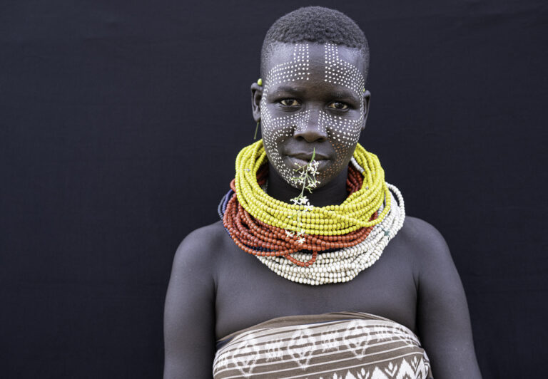 This beautiful woman is a member of the Kara tribe. The Kara members have four types of marriage: arranged, consensual, marriage through abduction, and marriage by inheritance.