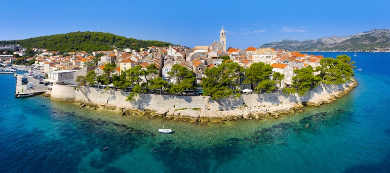 Tranquil waters surround much of Korčula, which juts out as a peninsula with a rounded shoreline