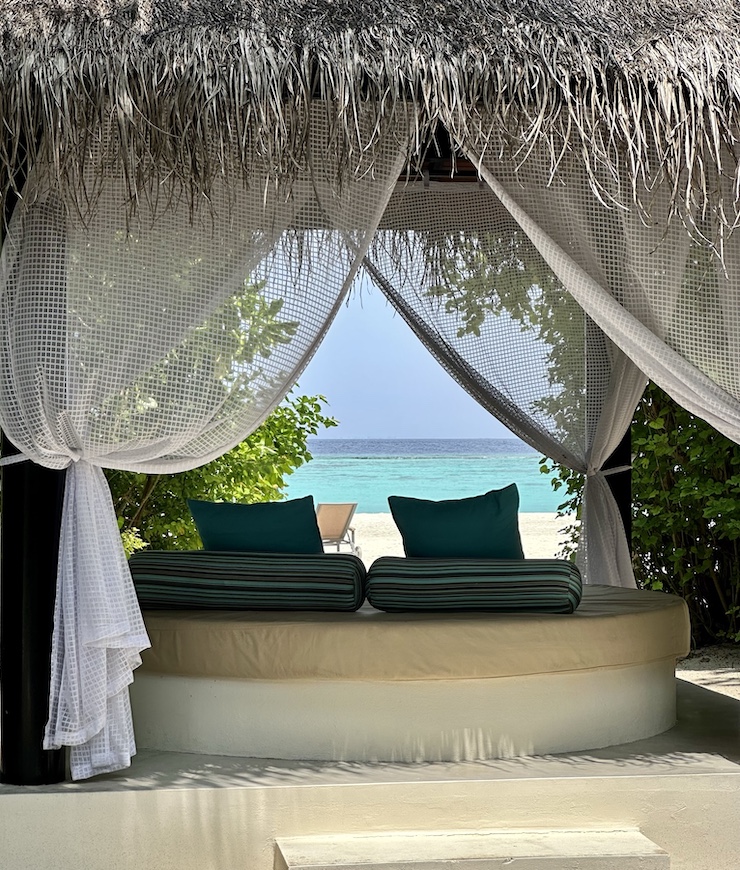 A serene seating area at Iru Fushi resort and spa in the Maldives.