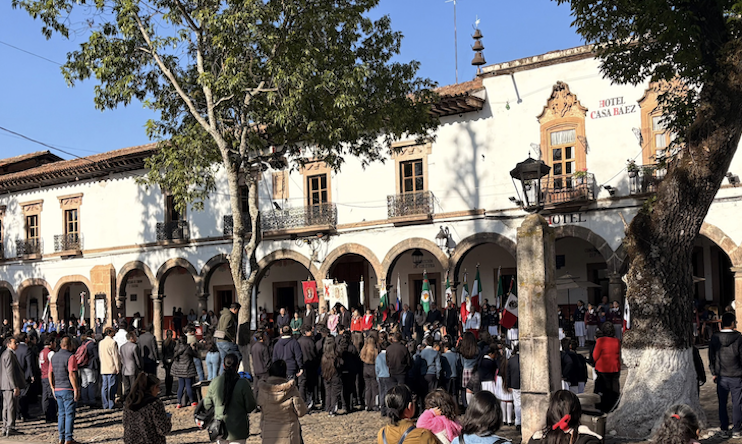 Mountain village of Patzcuaro celebrating Mexican Flag Day two days after violence roiled Michbegan. later that shows life back to normal for Flag Day.